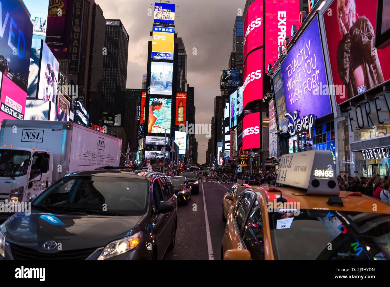 Theater District, New York City, NY, USA, Lots of carss driving through ...