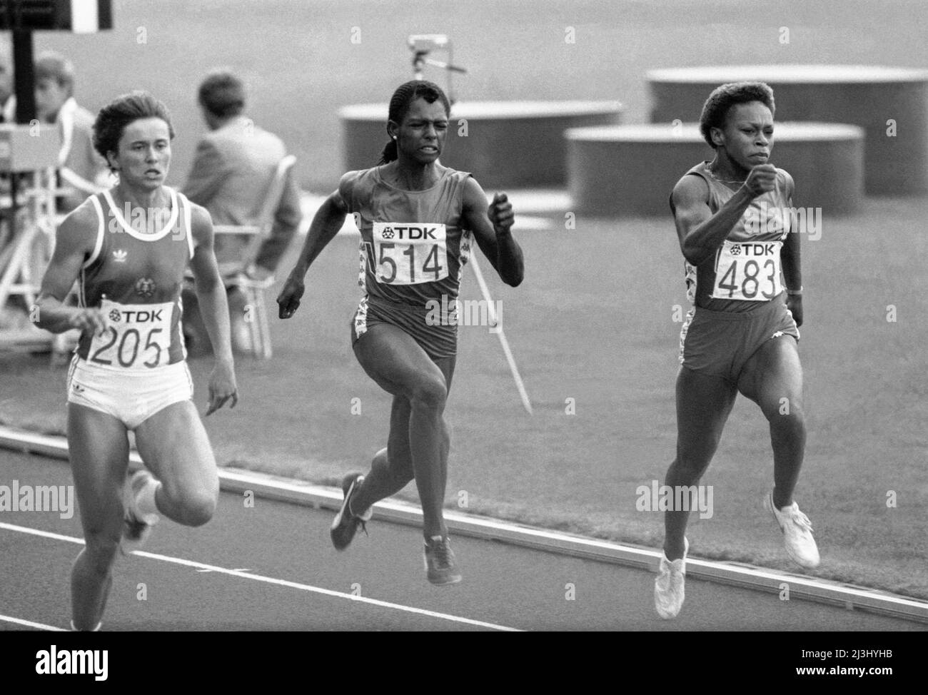 MARLIES GÖHR DDR win 100m before Diane Williams USA /514 / and Alice Brown USA /483/athletes at IAAF World Champion Ship in Helsinki Finland 1983 august Stock Photo