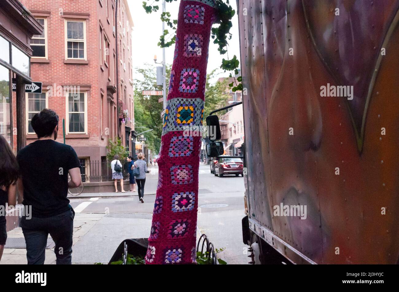 9TH AVE, New York City, NY, USA, Guerilla Knitting, Yarn Bombing trees Stock Photo