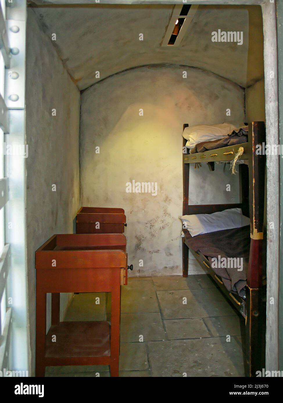 prisoners' cell interior, 2 person, 6x6x8 feet; stark, bunk beds