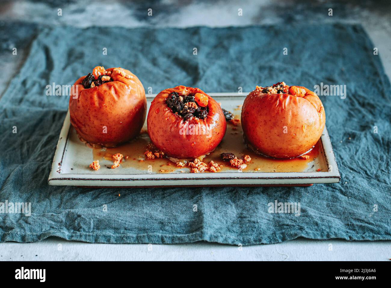 Baked Apples Stuffed with Dried Fruit and Apricots Stock Photo