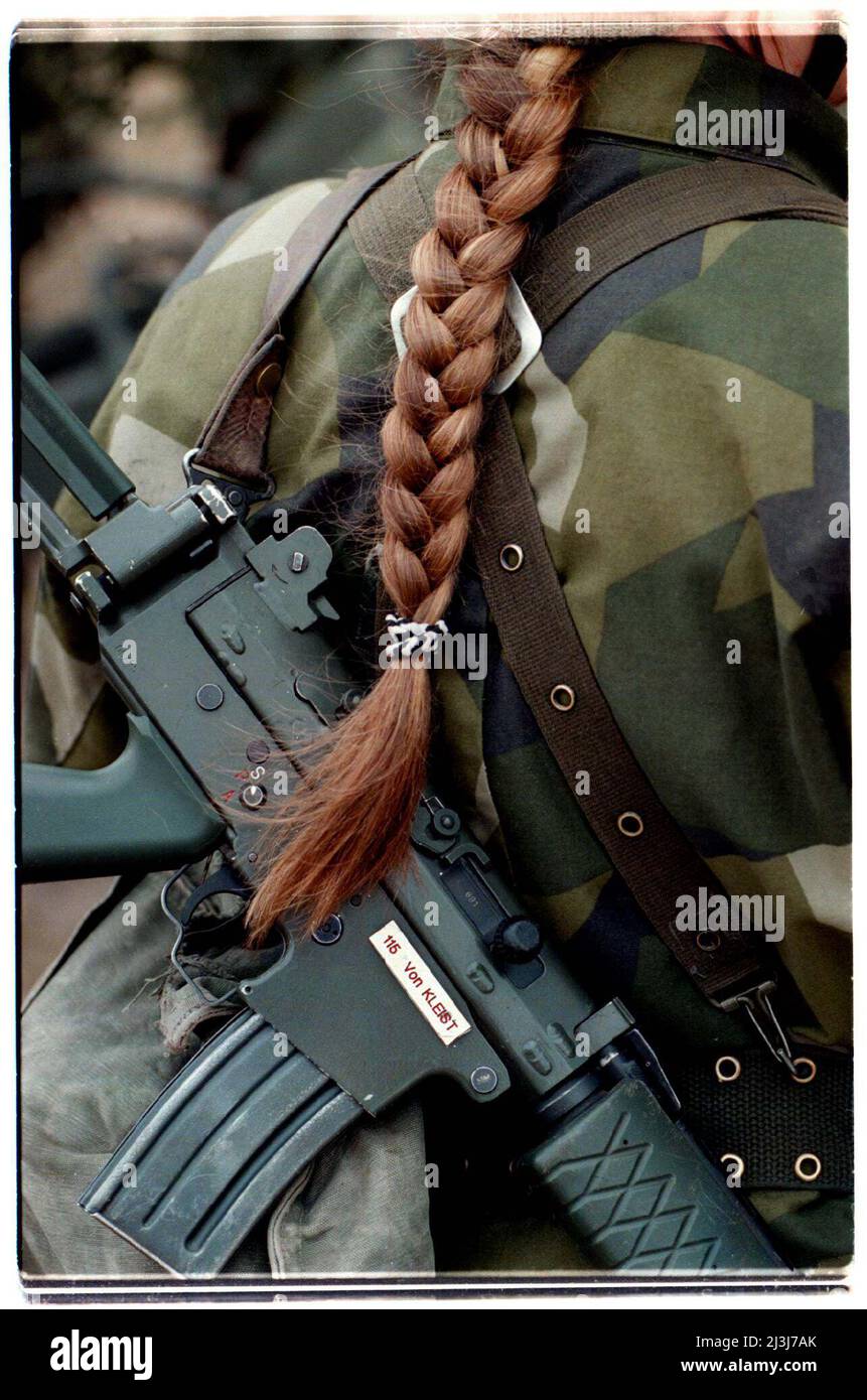 A female conscript Swedish soldier in the Swedish army during a military  exercise Stock Photo - Alamy