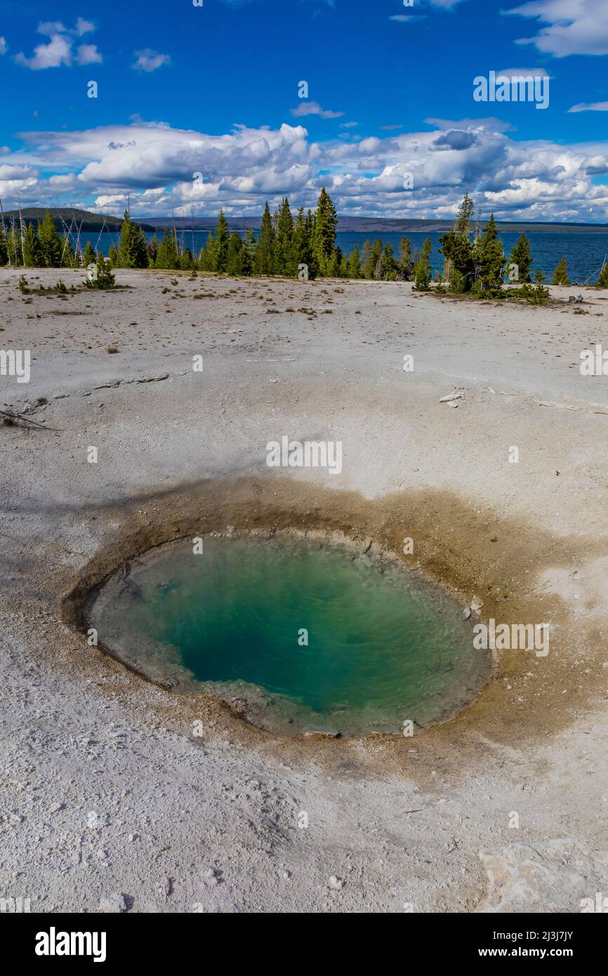 Blue Funnel Spring in West Thumb Geyser Basin in Yellowstone National Park, USA Stock Photo