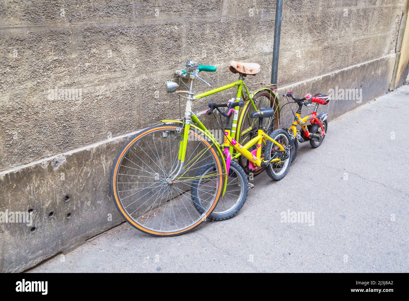 Traditional bicycles parked against wall, Florence, Tuscany, Italy, Europe Stock Photo