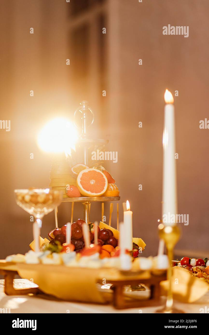 Luxury romantic candlelight dinner table setup for couple in ocean view restaurant on Valentine