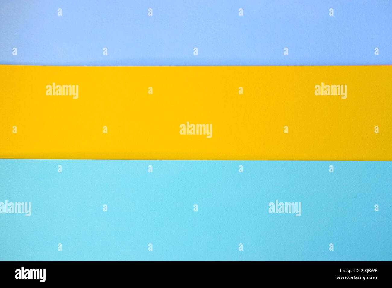 Striped background with blue and yellow textures. Stock Photo