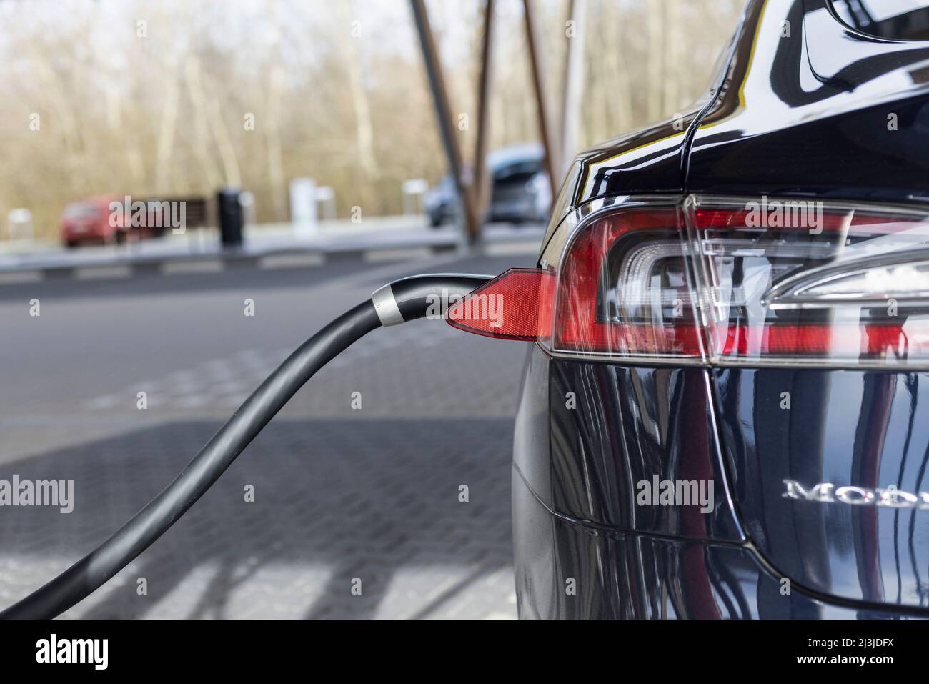 Detail of a Tesla Model S at the charging station in Germany Stock ...