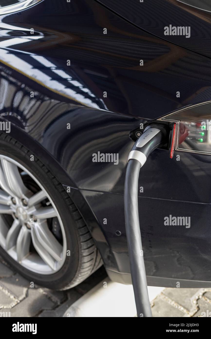 Detail of a Tesla at the charging station in Germany Stock Photo Alamy