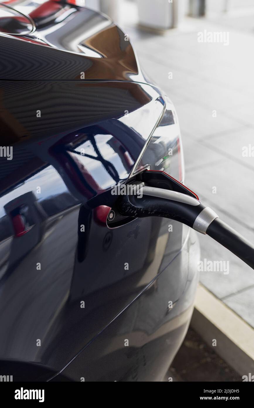 Detail of the charging plug when charging a Tesla in Germany Stock