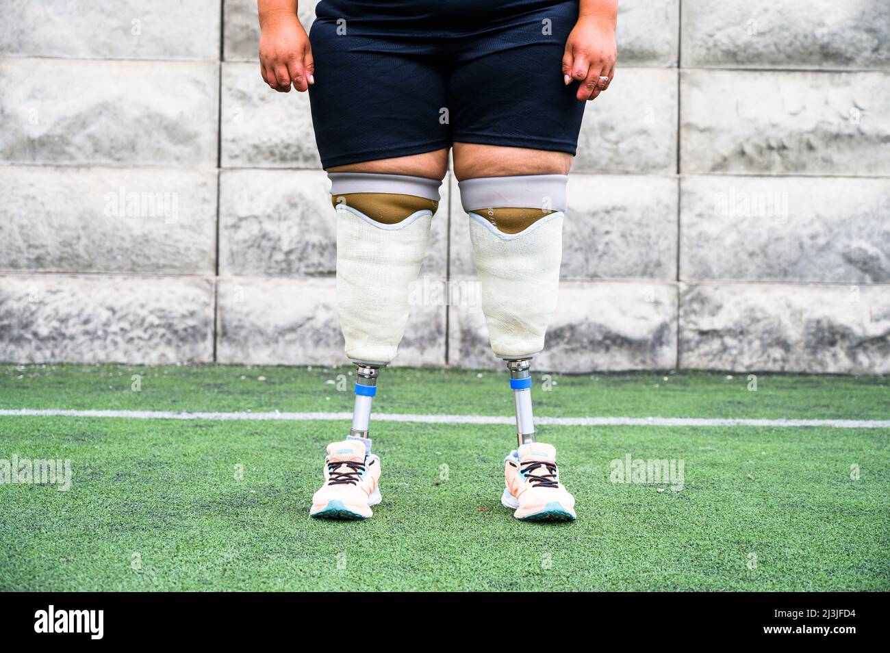 Unrecognizable female athlete with prosthetic legs Stock Photo