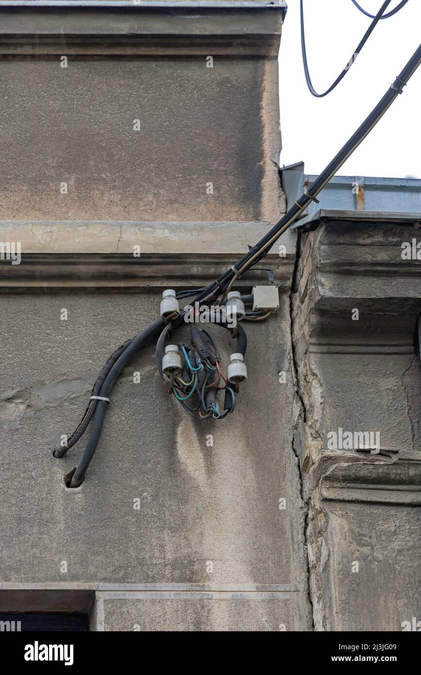 Old House Aerial Electrical Power Connection Damaged Wire Insulation