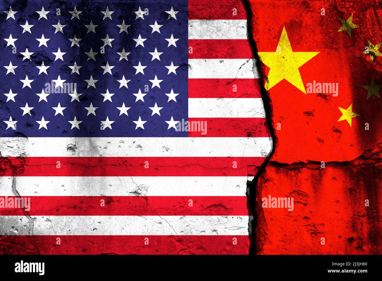 United States and China crisis. Background with national flags on cracked wall Stock Photo
