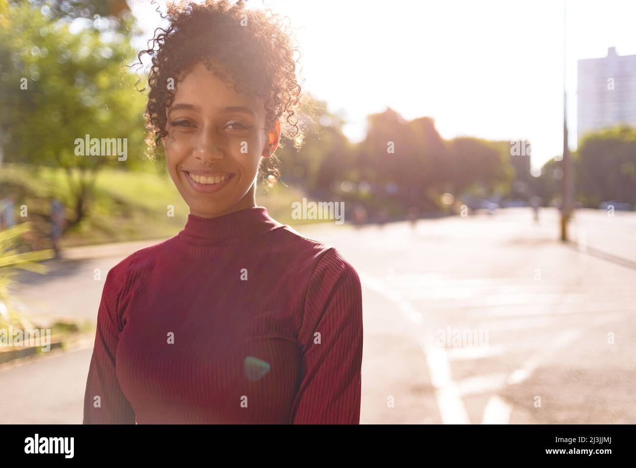 African American young woman portrait outdoors in urban landscape Stock ...