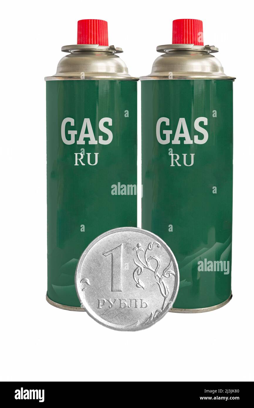 Two cylinders with Russian liquefied gas and a one ruble coin Stock Photo