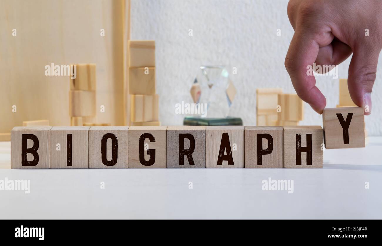Biography headline sign made of wood on a table Stock Photo Alamy