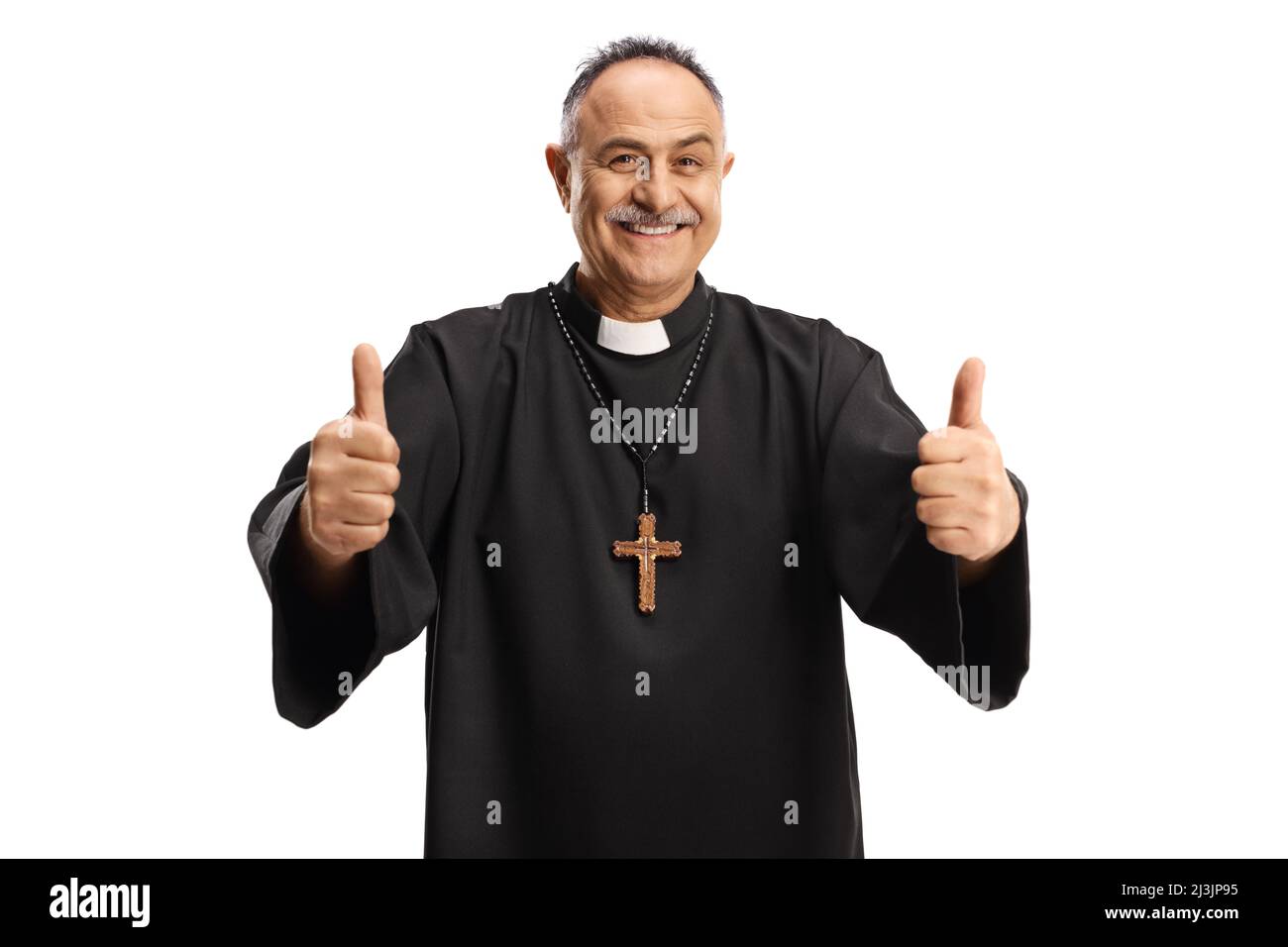 Happy priest gesturing with both thumbs up and smiling at camera isolated on white background Stock Photo