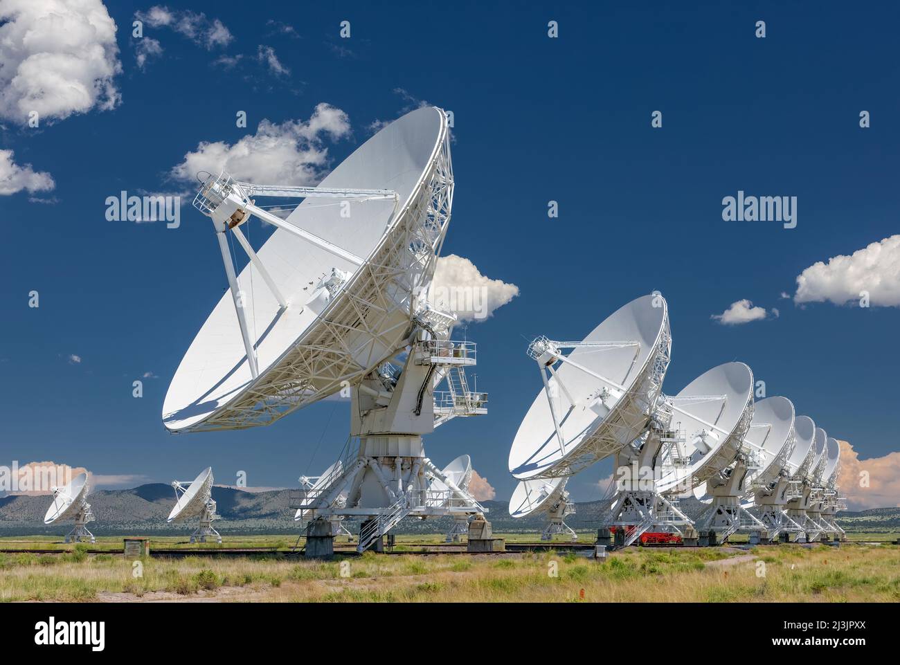 The VLA - Very Large Array - Radio Telescope in Socorro, New Mexico An astronomical interferometer is an array of telescopes or mirror segments acting Stock Photo