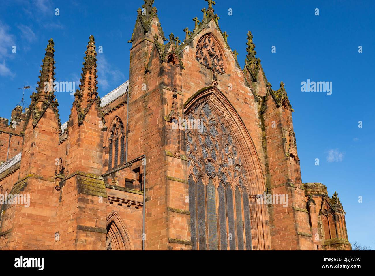 Exterior of old Cathedral in a town center on a beautiful Spring morning.  Carlisle, England. Stock Photo
