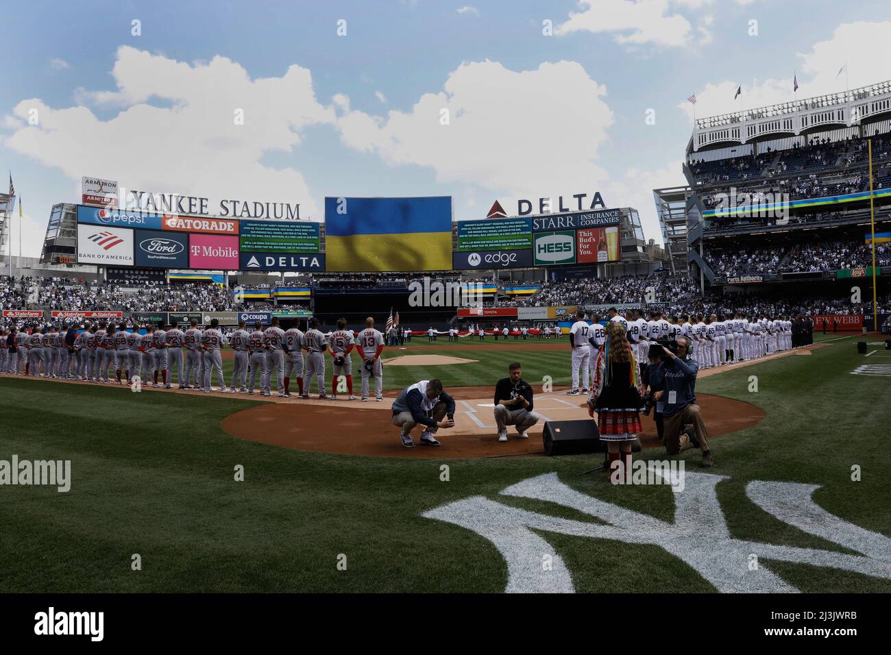 Bronx, USA. 08th Apr, 2022. 11yearold Yulia Holiyat, right sings the
