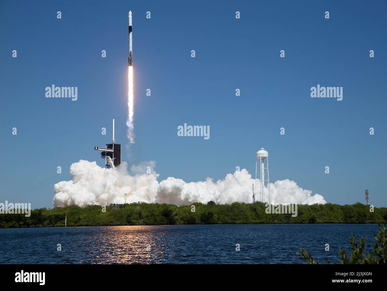 Florida, USA. 08th Apr, 2022. A SpaceX Falcon 9 rocket carrying the company's Crew Dragon spacecraft is launched on Axiom Mission 1 (Ax-1) to the International Space Station with Commander Michael López-Alegría of Spain and the United States, Pilot Larry Connor of the United States, and Mission Specialists Eytan Stibbe of Israel, and Mark Pathy of Canada aboard, Friday, April 8, 2022, at NASA's Kennedy Space Center in Florida. The Ax-1 mission is the first private astronaut mission to the International Space Station. López-Alegría, Connor, Pathy, Stibbe launched at 11:17 a.m. from Launch Compl Stock Photo