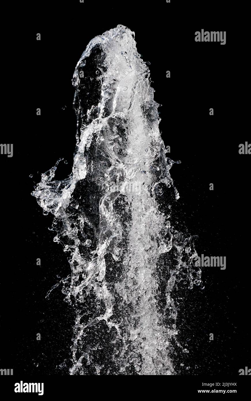 Water splash isolated over black background, vertical orientation Stock
