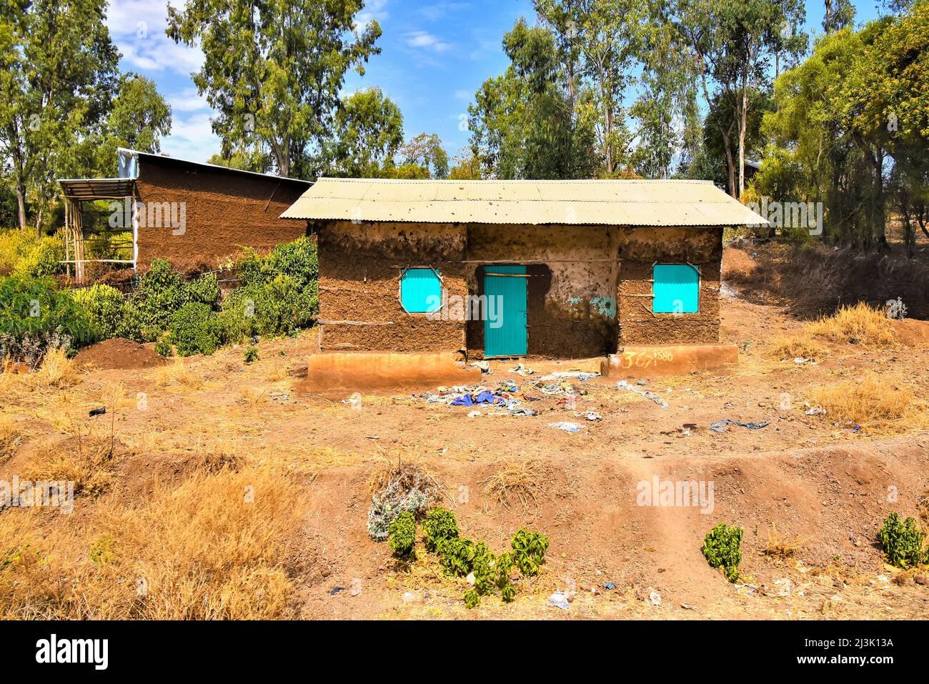 House and barn on a farm in the Highlands of Ethiopia; Ethiopia Stock