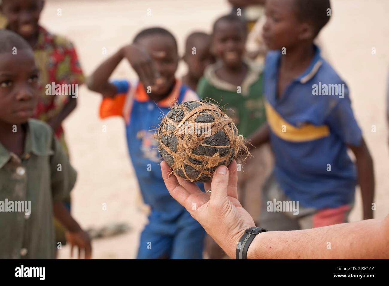 A 'soccer' ball made of twine and duct tape.; Luozi, Zaire River