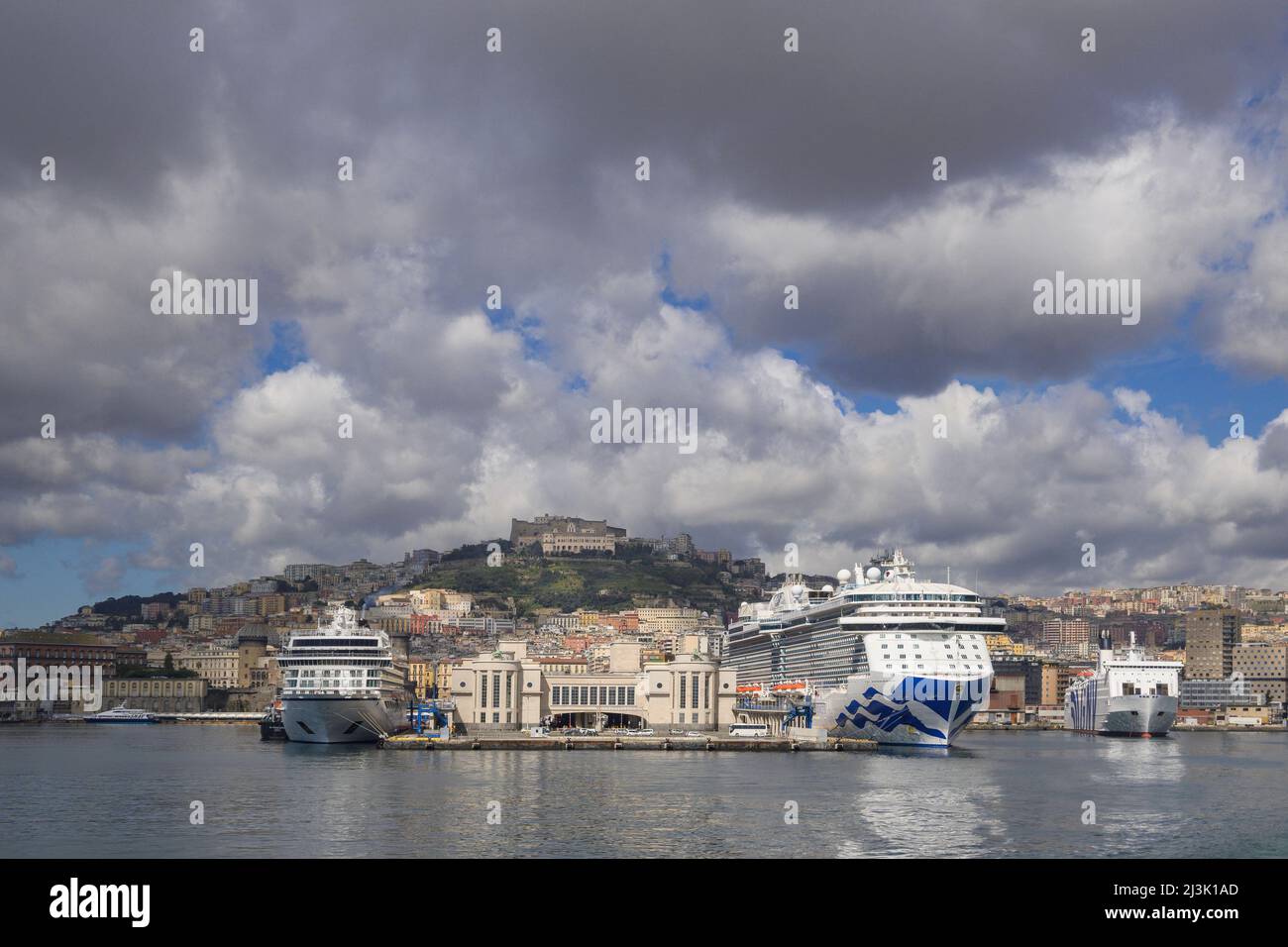 View of Naples from the port with a docked cruise ship and a ferry Campania Italy Stock Photo