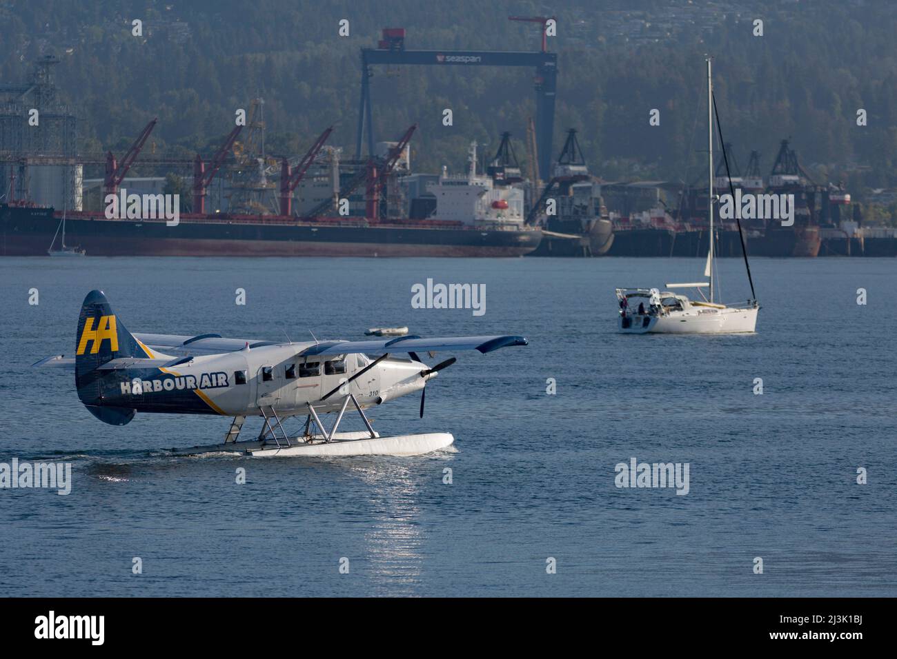 Float plane and sailboat in the harbour of Vancouver; Vancouver ...