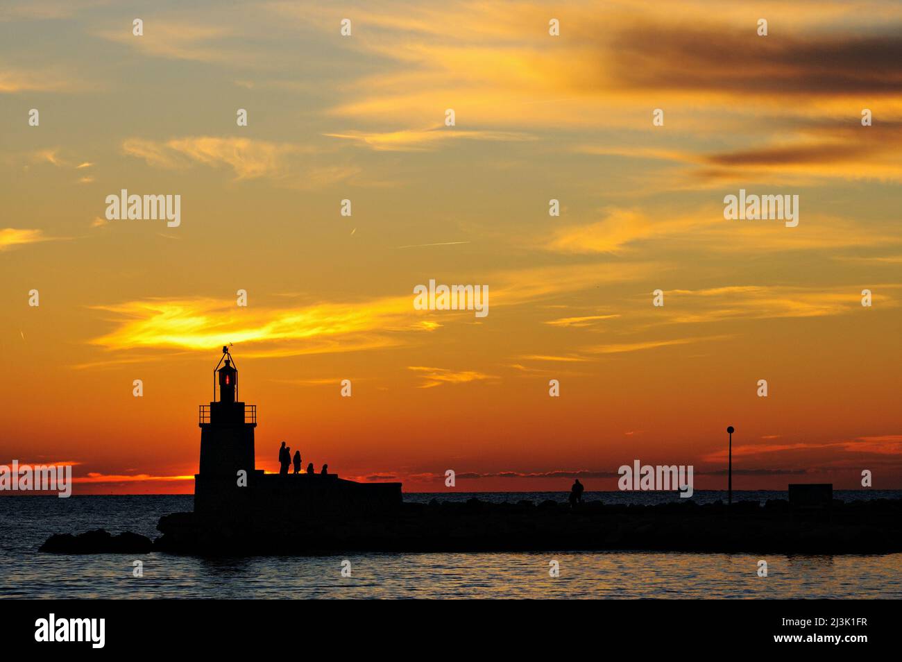Lighthouse of Sanary-sur-Mer at sunset, Var, Provence-Alpes-Côte d'Azur, France Stock Photo