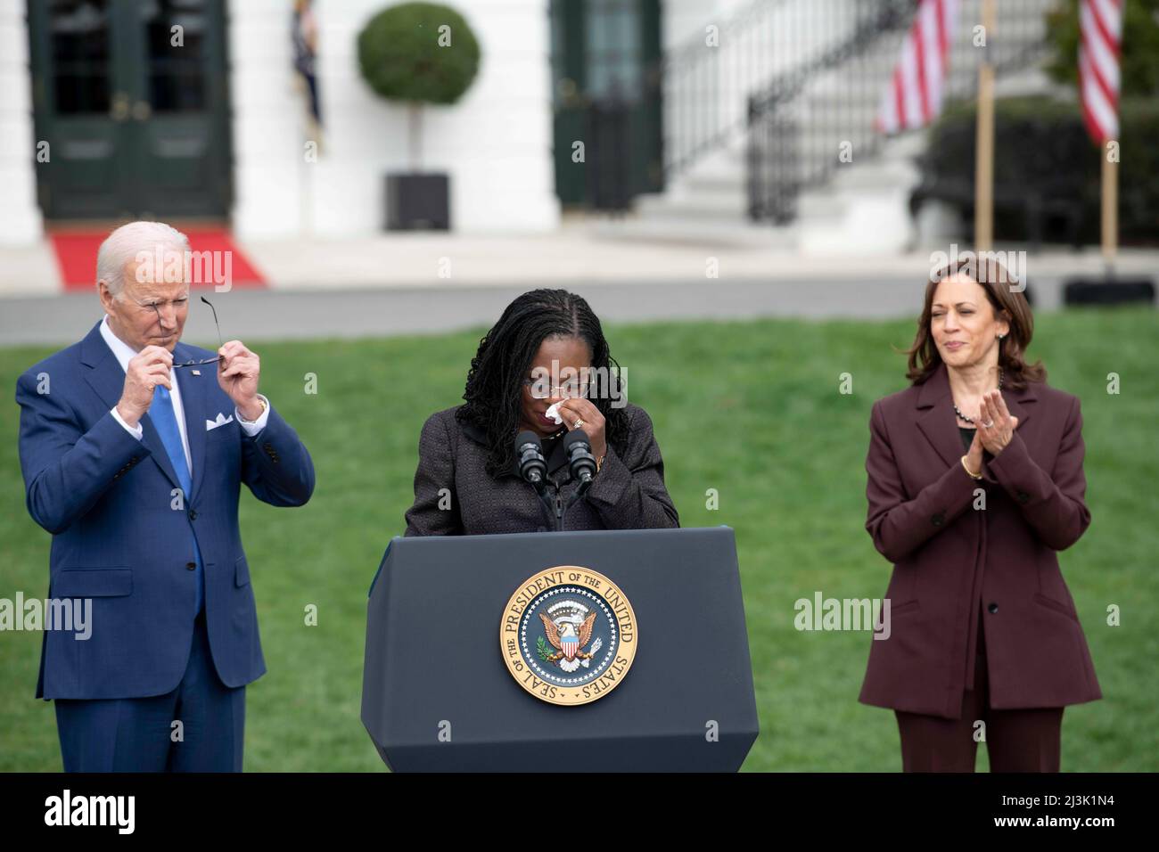 Washington, USA. 8th Apr, 2022. Judge Ketanji Brown Jackson (C), U.S. President Joe Biden (L) and Vice President Kamala Harris attend an event marking the Senate confirmation of Jackson for the Supreme Court at the South Lawn of the White House in Washington, DC, the United States, on April 8, 2022. The White House held the event Friday afternoon to mark the Senate confirmation of the first African American woman for the Supreme Court. Credit: Liu Jie/Xinhua/Alamy Live News Stock Photo