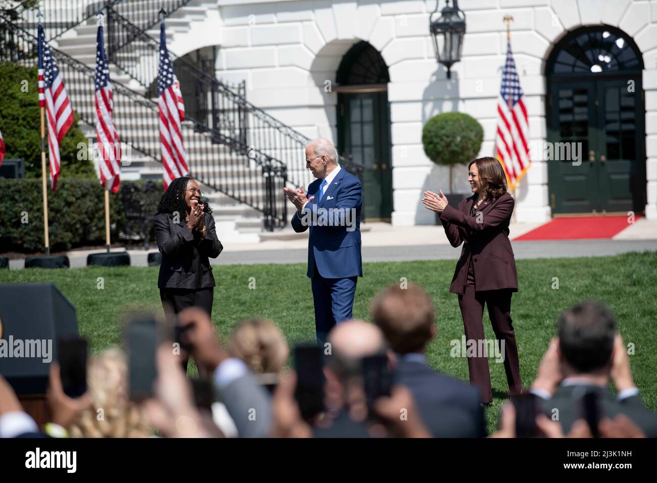 Washington, USA. 8th Apr, 2022. Judge Ketanji Brown Jackson (L), U.S. President Joe Biden (C) and Vice President Kamala Harris attend an event marking the Senate confirmation of Jackson for the Supreme Court at the South Lawn of the White House in Washington, DC, the United States, on April 8, 2022. The White House held the event Friday afternoon to mark the Senate confirmation of the first African American woman for the Supreme Court. Credit: Liu Jie/Xinhua/Alamy Live News Stock Photo