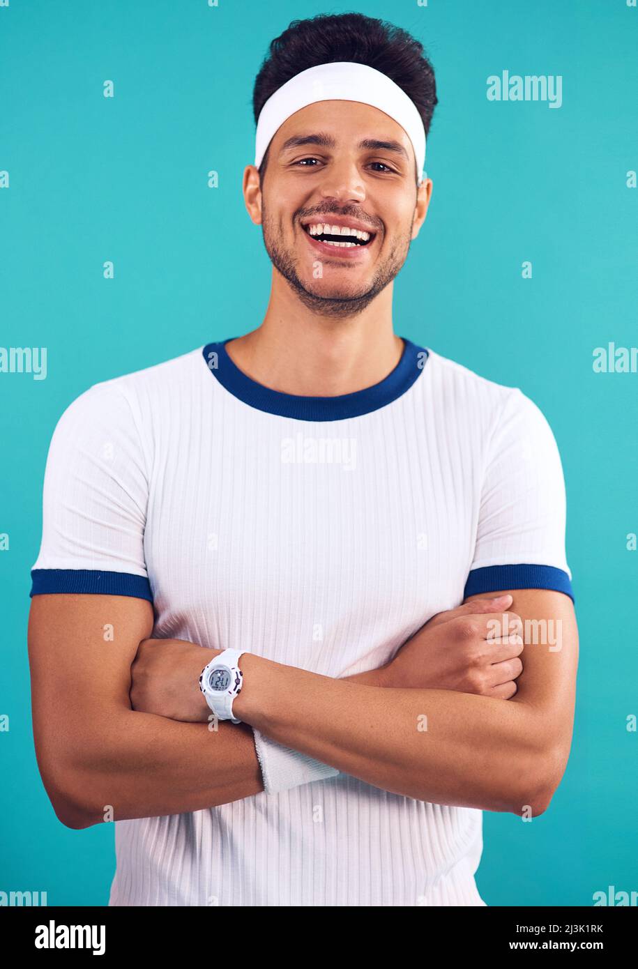 Fit for a trip to the country club. Cropped shot of a handsome young man styled in 80s fashion. Stock Photo