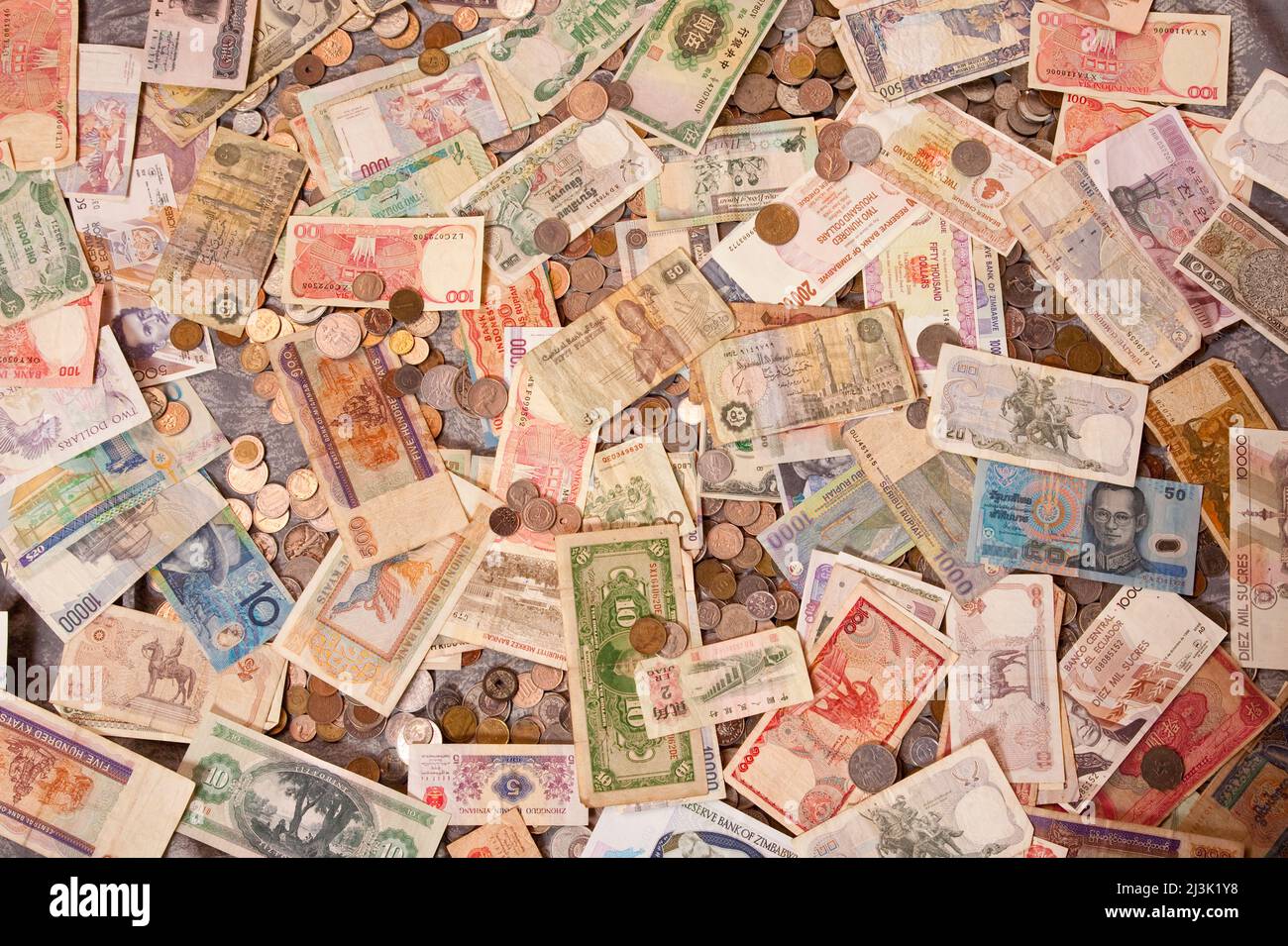 Paper money from around the world hi-res stock photography and