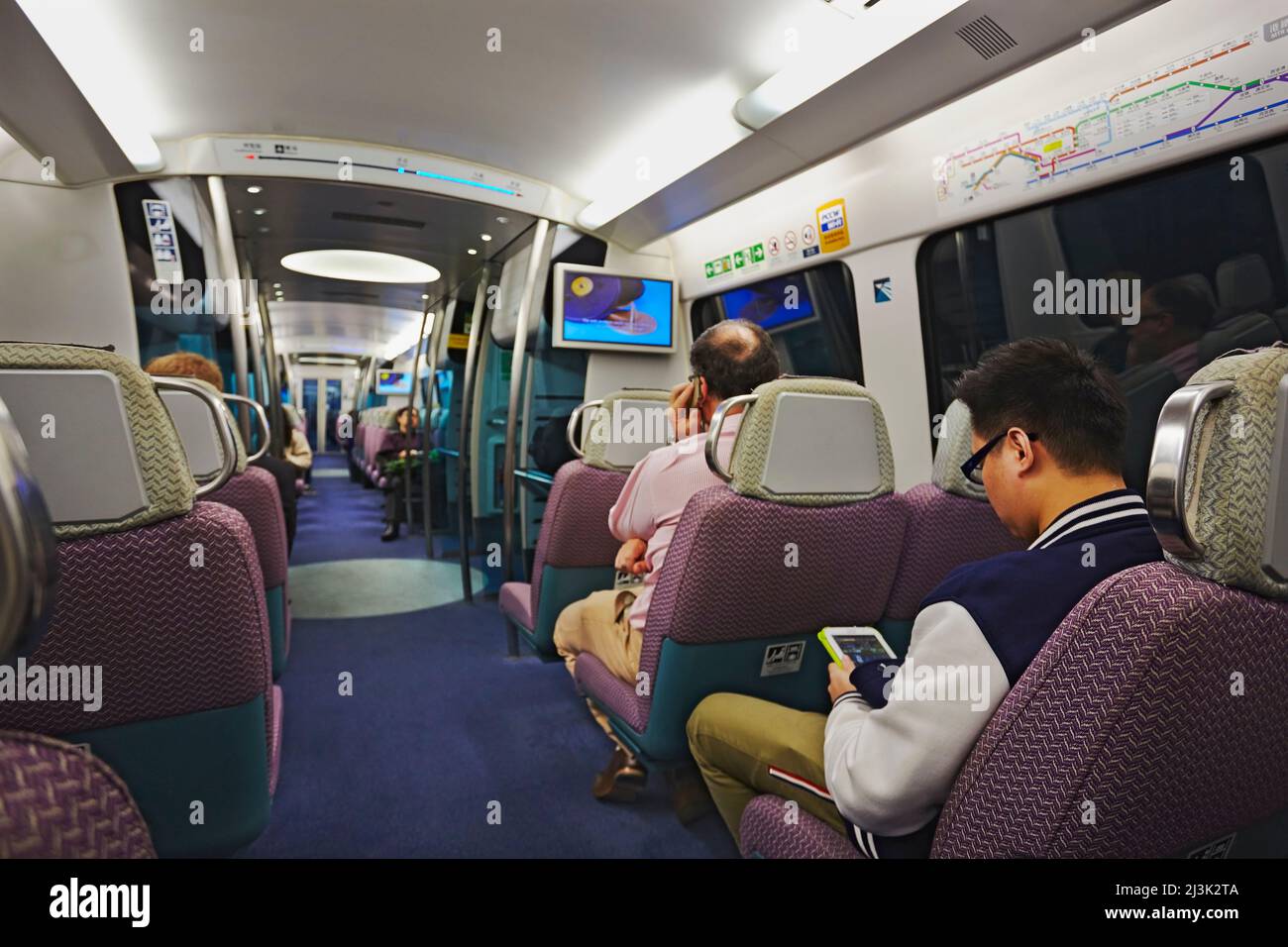 Aboard the Airport Express train, en route to the Hong Kong International  Airport, Hong Kong.; Hong Kong Stock Photo - Alamy