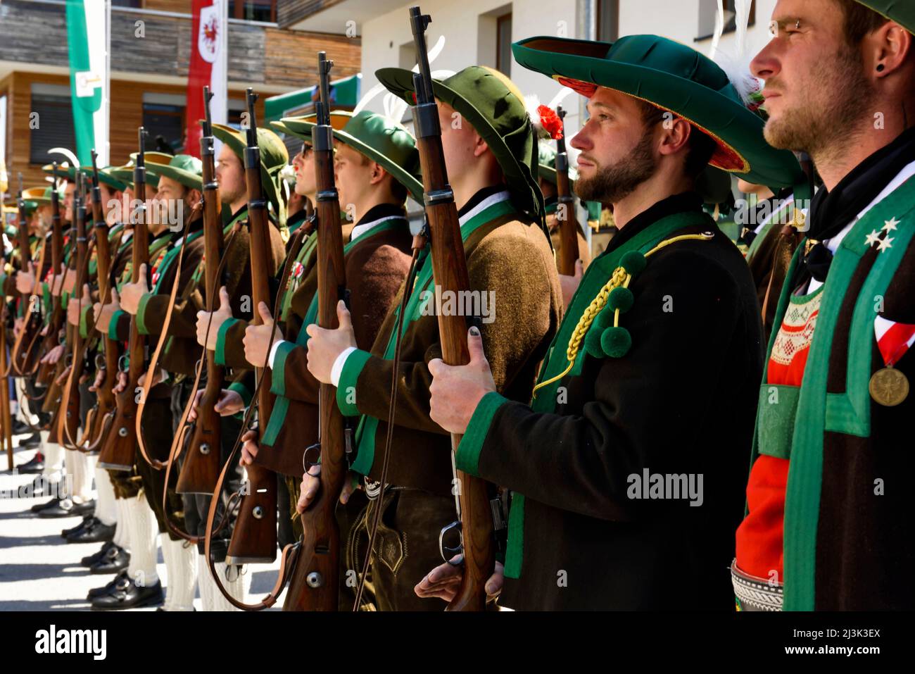 Riflemen from Weerberg line up and prepare to fire a single shot in the centre of Weerberg Village. The Herz-Jesu festival was born out of the Napoleo Stock Photo
