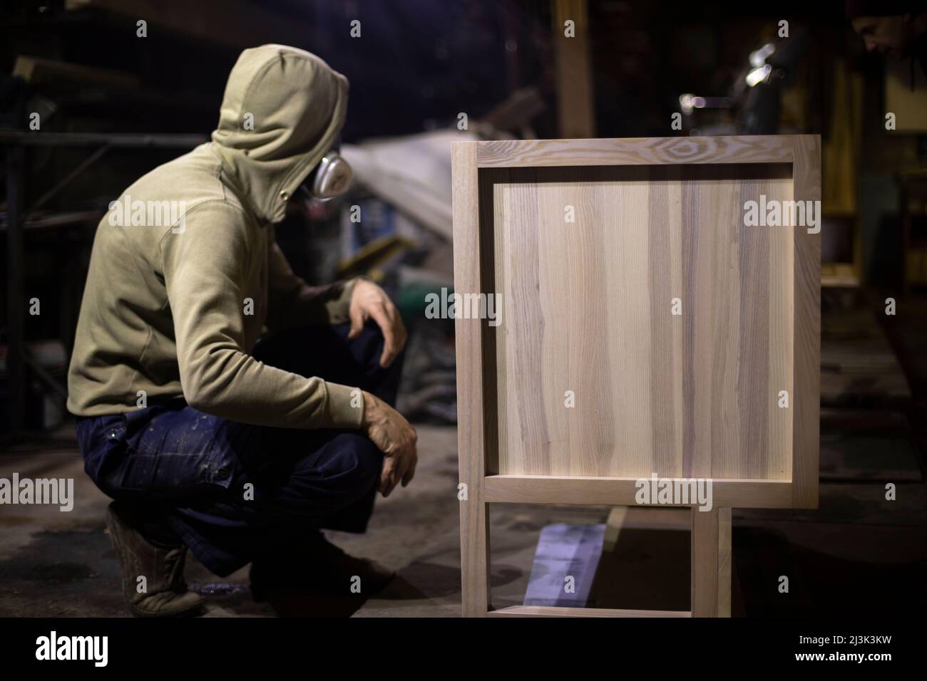 Master who makes furniture. Carpenter in Wardrobe and person