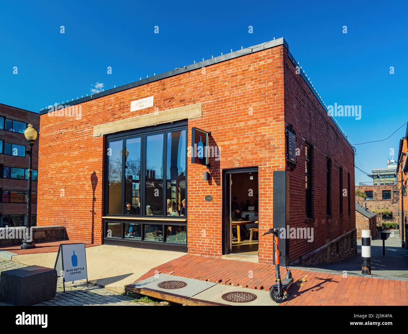 Washington DC, APR 3 2022 Sunny view of the Blue Bottle Coffee Stock