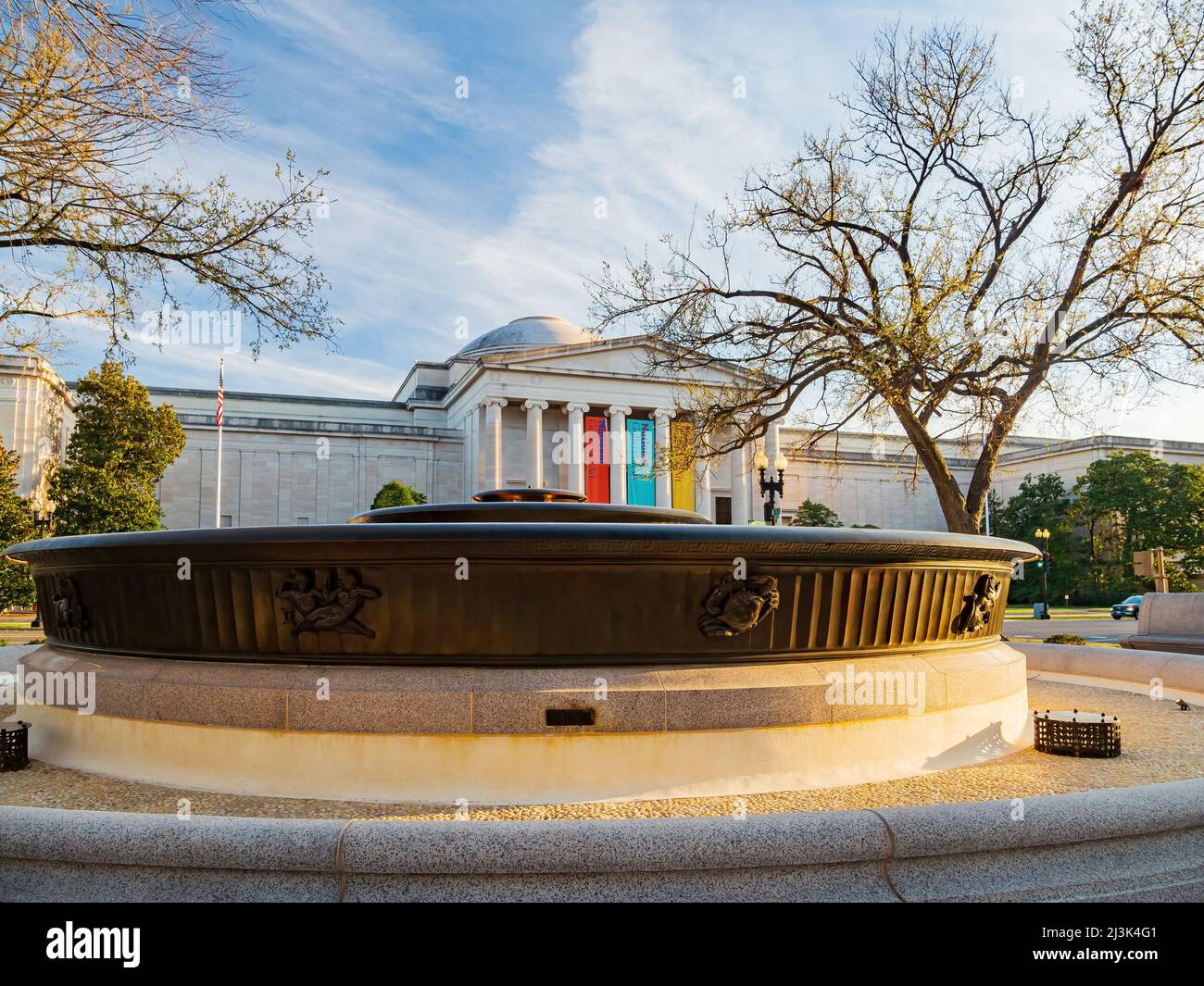 Washington DC, APR 2 2022 - Sunny view of the Andrew W. Mellon Memorial Fountain and National Gallery of Art Stock Photo