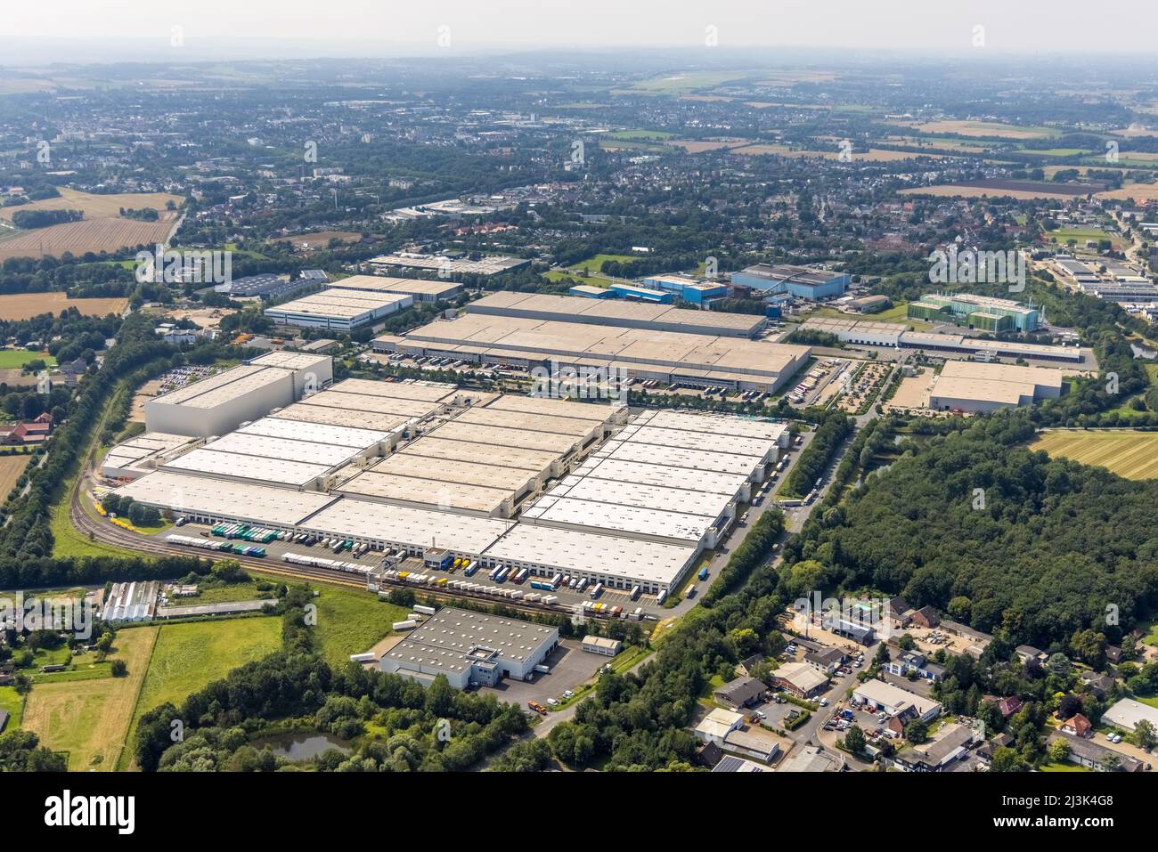Aerial photograph, Unna-Nord industrial estate with Fiege Unna GmbH and DHL Logistics, Alte Heide in Unna, Ruhr area, North Rhine-Westphalia, Germany, Stock Photo