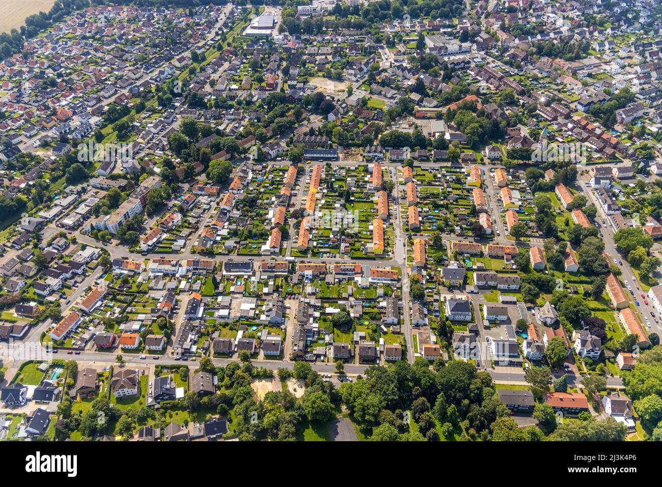 Aerial view, miners' housing estate between Pröbstingstraße and Bergstraße with red roofs in the district of Heeren-Werve, Kamen, Ruhr area, North Rhi Stock Photo
