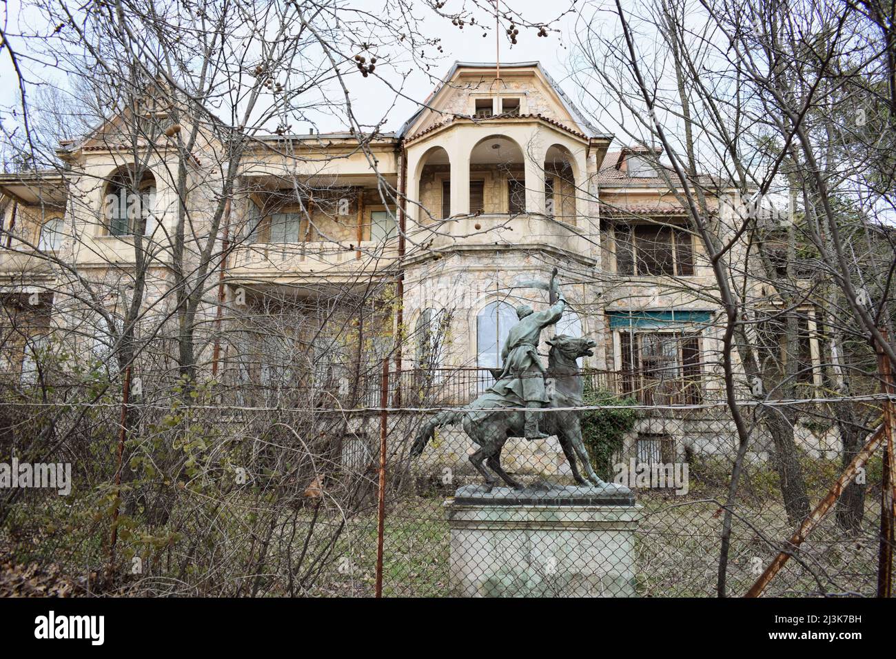 A sculpture of a hunter riding a horse in front of the summer Palace of former Royal Greek family at Tatoi, Acharnes, Greece Stock Photo