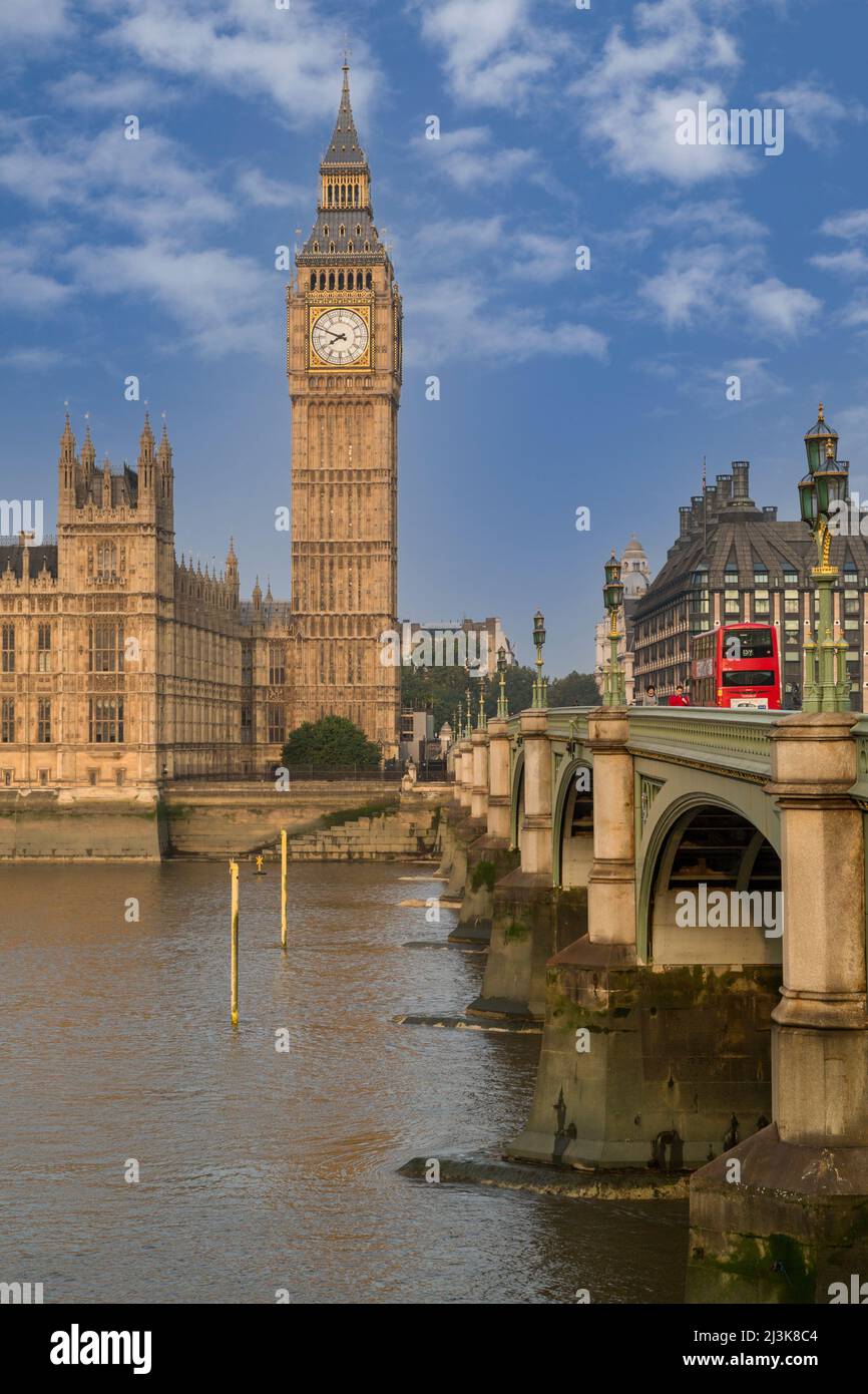 UK, England, London.  Big Ben, Elizabeth Tower, Thames River, Early Morning.  Portcullis Parliament Office Building on right. Stock Photo