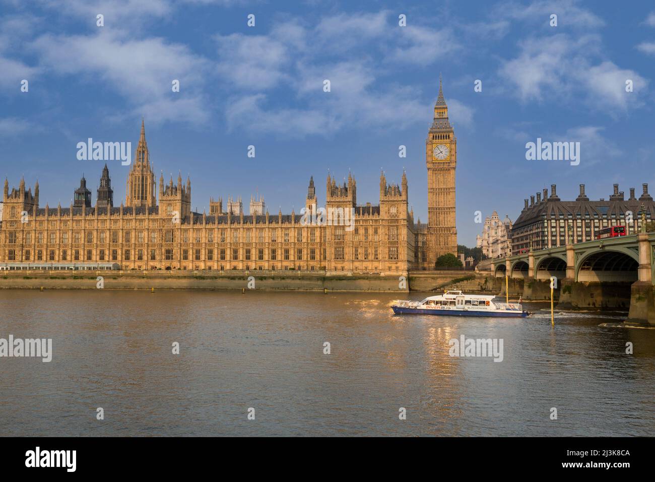 UK, England, London.  Big Ben, Elizabeth Tower, Westminster palace, Thames River, Early Morning.  Portcullis Parliament Office Building on right. Stock Photo