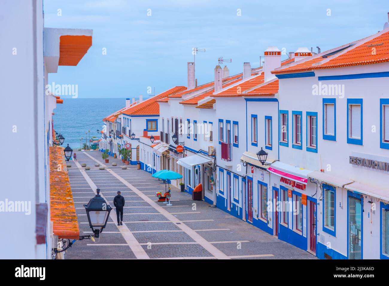 Porto Covo, Portugal, June 21, 2021: Narrow street of the old town at  Portuguese town Porto Covo Stock Photo - Alamy