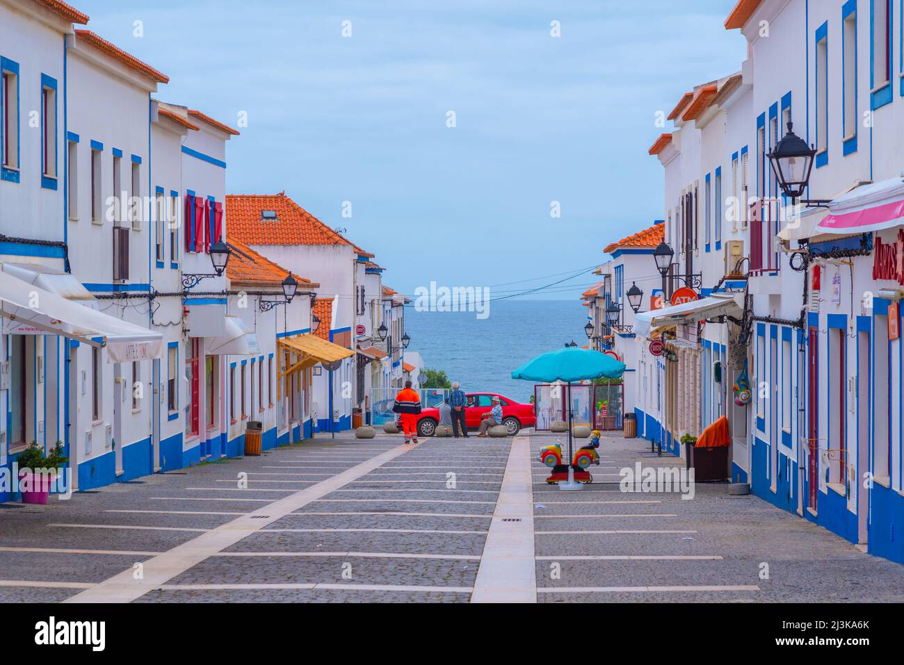 Porto Covo, Portugal, June 21, 2021: Narrow street of the old town at  Portuguese town Porto Covo Stock Photo - Alamy