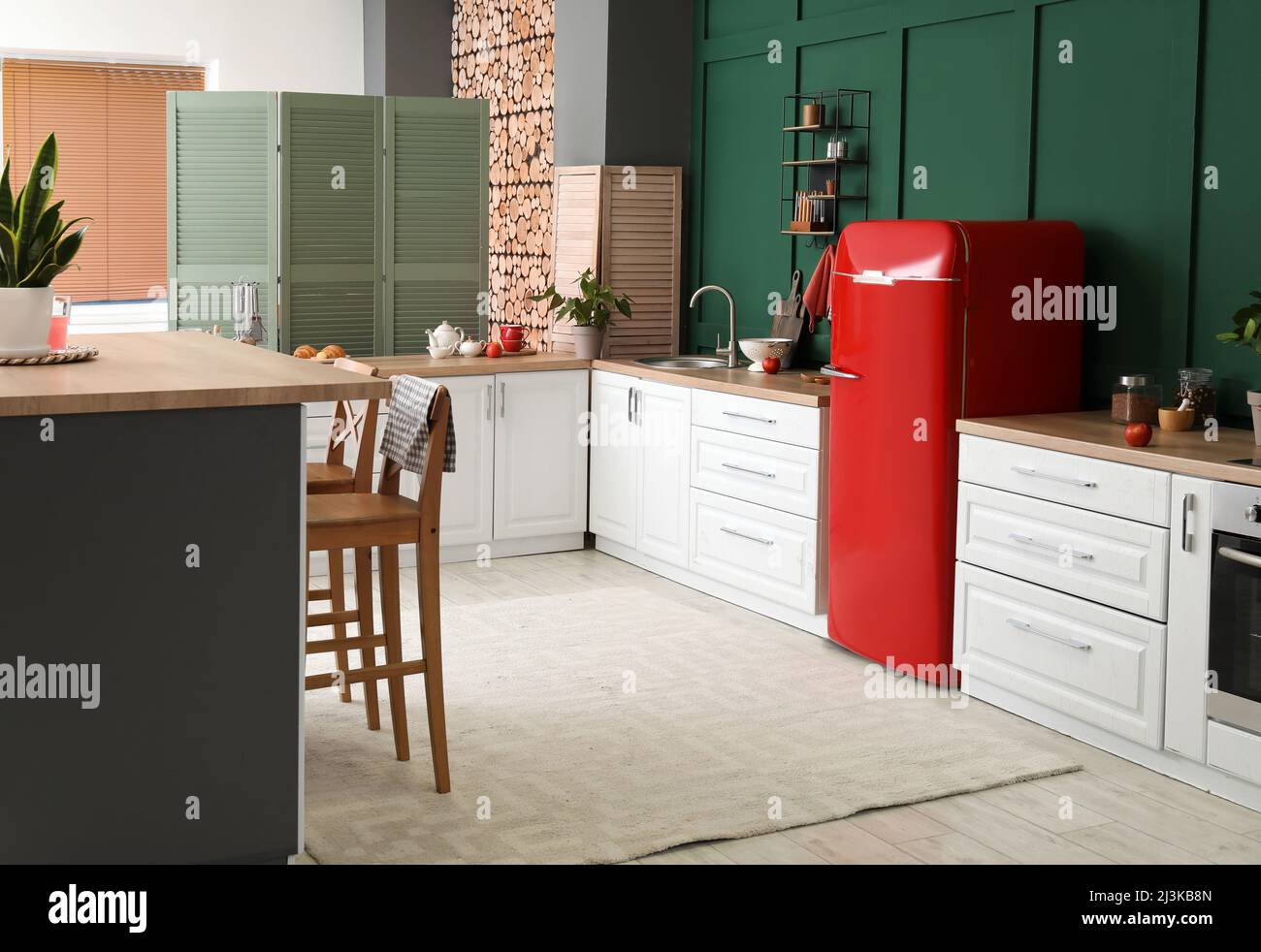 Interior of modern kitchen with stylish refrigerator and counters Stock ...