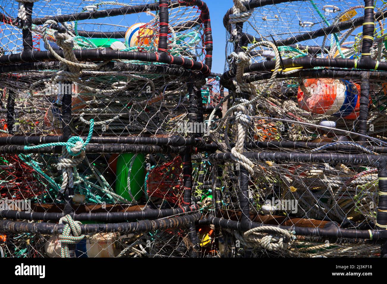 Stack of colorful, heavy duty commercial crab pots Stock Photo Alamy