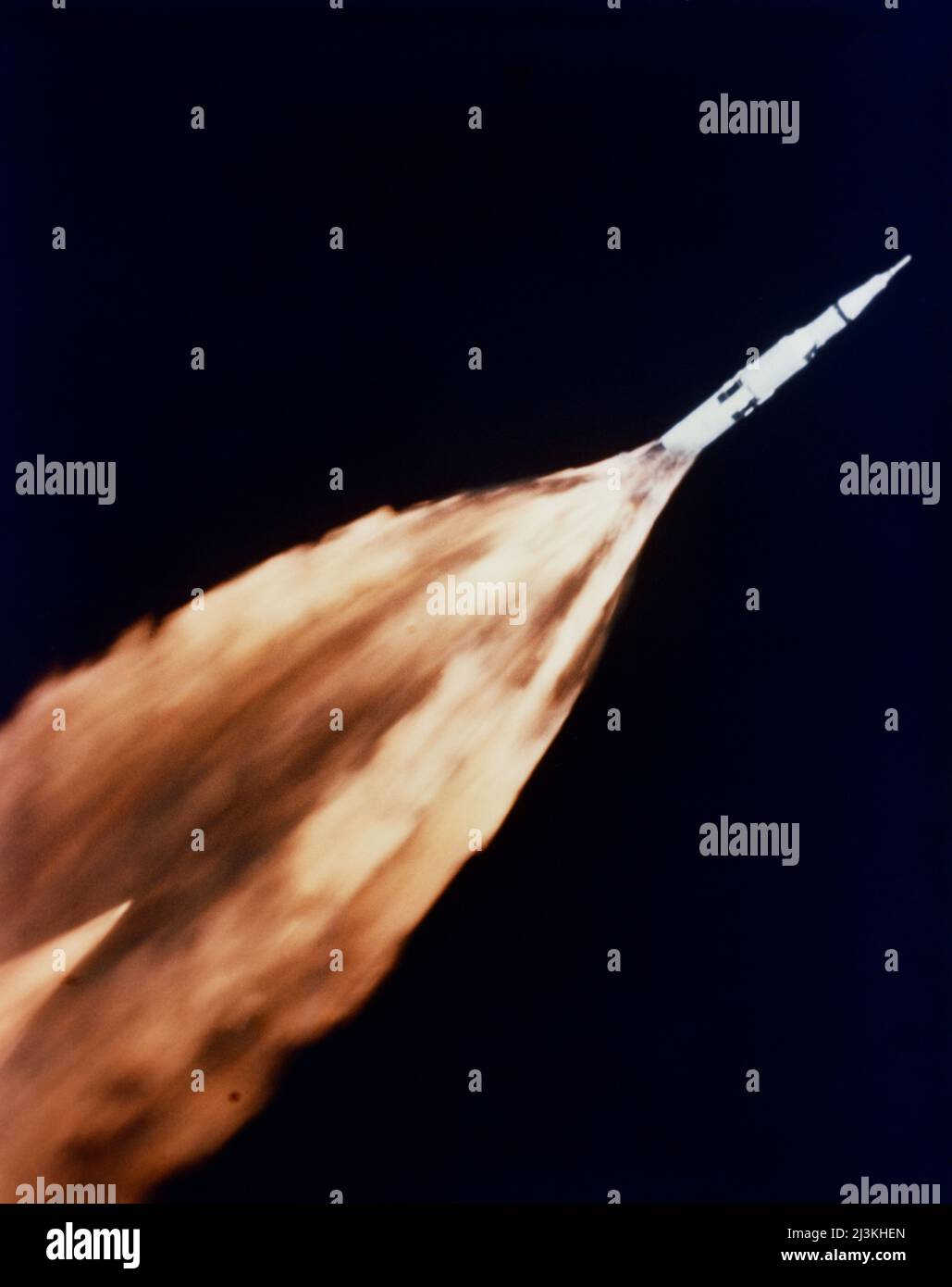 The five F-1 engines of the huge Apollo/Saturn V srocket leave a gigantic trail of flame in the sky above the Kennedy Space Center seconds after liftoff. The launch of the Apollo 6 (Spacecraft 020/Saturn 502) unmanned space mission was on, April 4, 1968. This view of the Apollo 6 launch was taken from a chase plane. Stock Photo