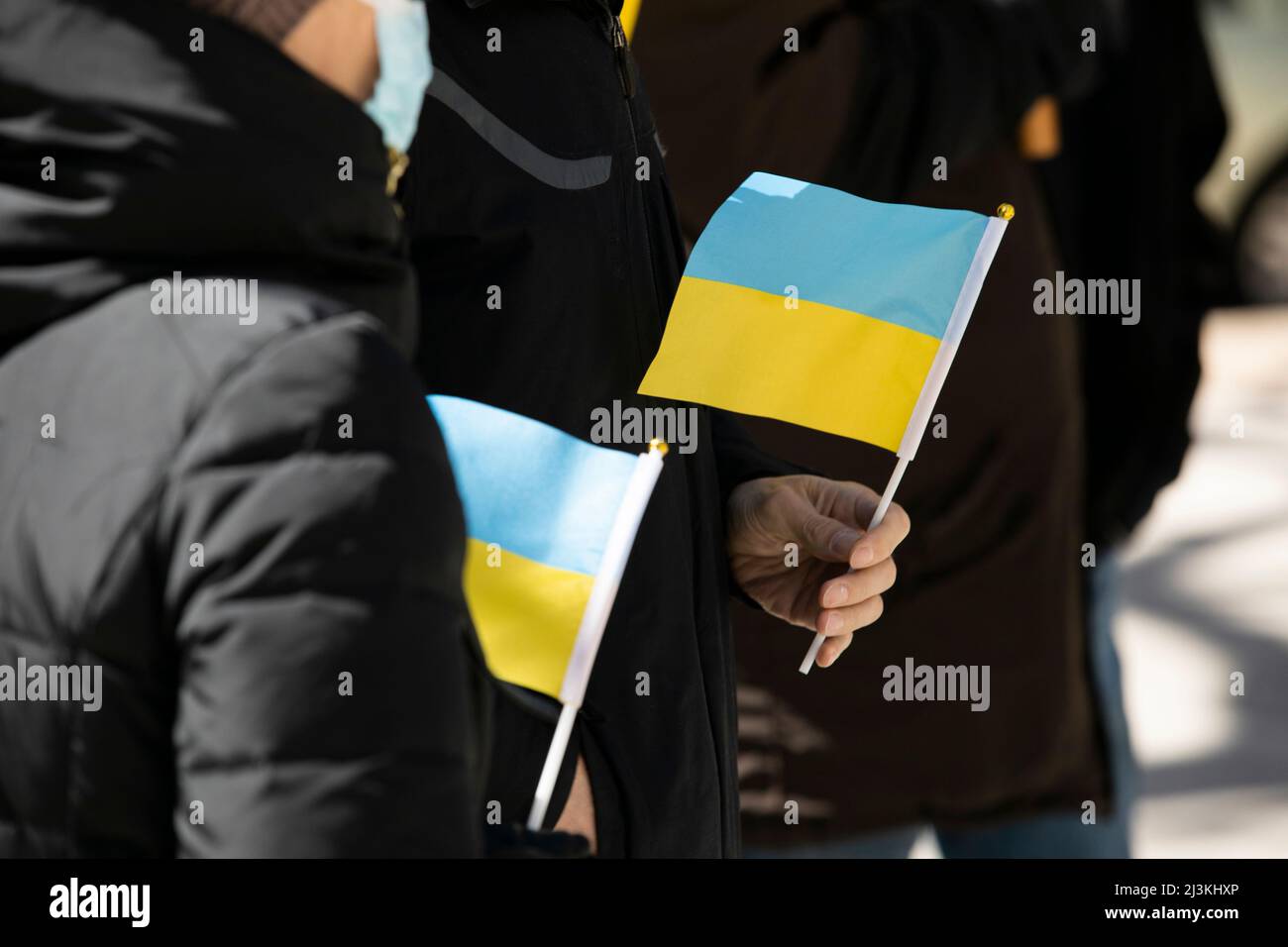 Chicago, Illinois, USA - March 27, 2022: People gather in solidarity with Ukraine against Russian aggression. Stock Photo